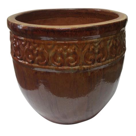 This planter is ideal for adding a dramatic effect to a porch, patio or poolside. . Home depot ceramic pots